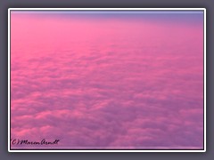 Auf rosa Wolken