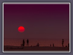 St Peter Ording - Glutrote Sonne über der Nordsee